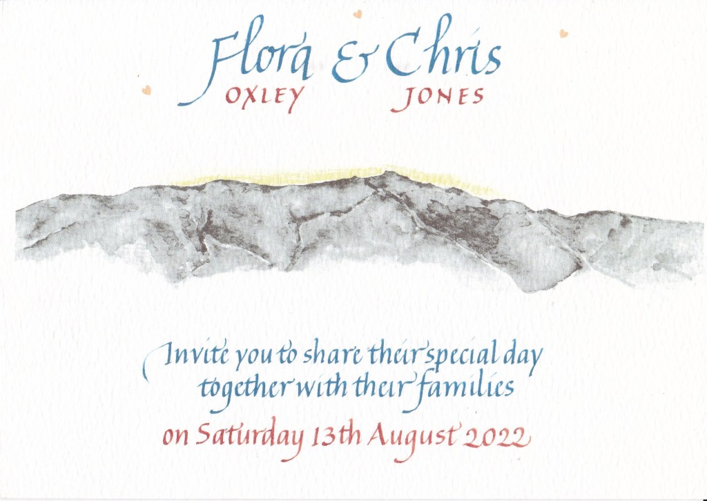 A hand painted wedding invitation